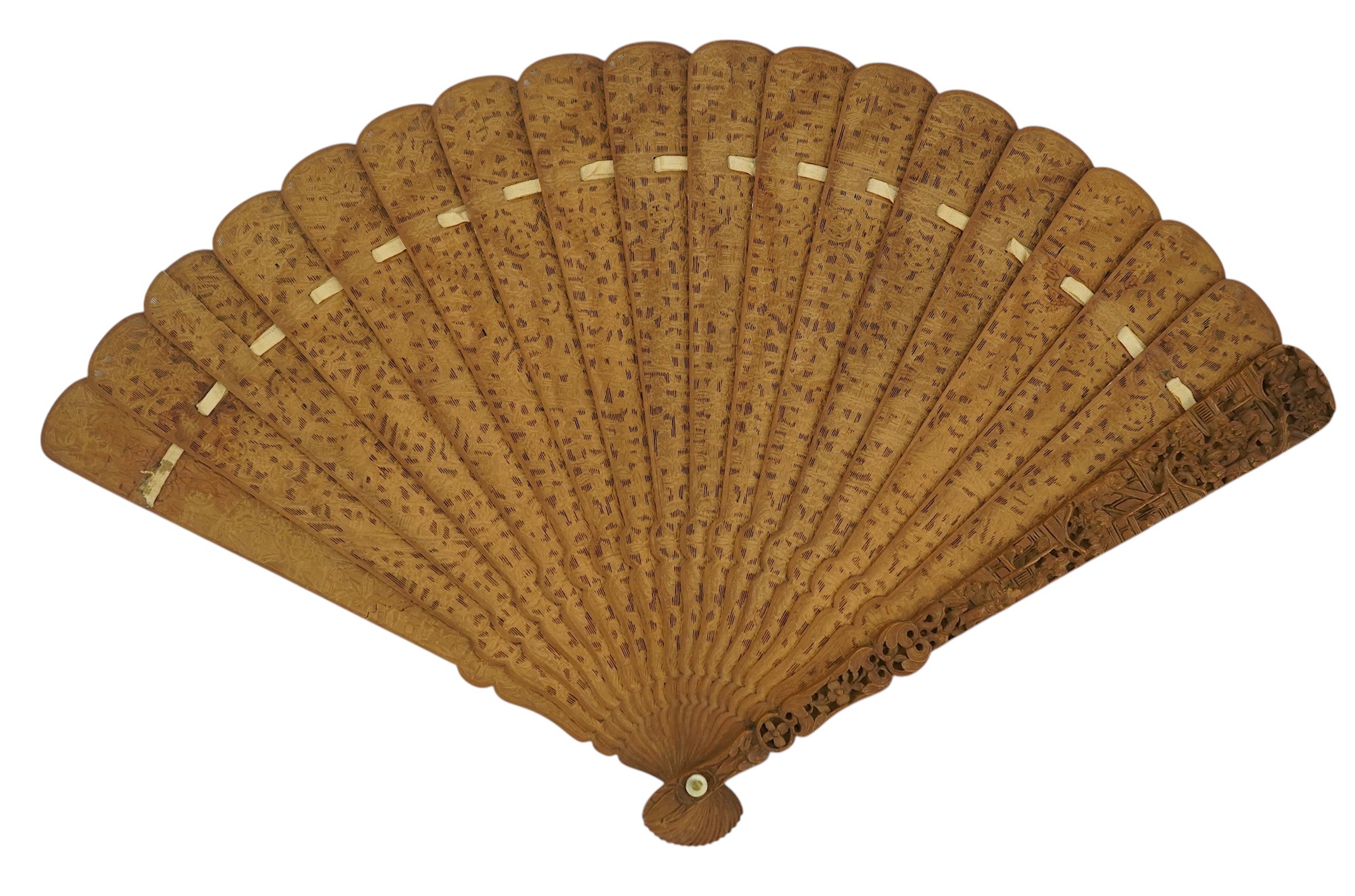 A fine Chinese sandalwood brise fan with finely carved sticks and guards, together with a mid 20th century silk calligraphic poetry LuYou fan, brise fan 38cm wide. Condition - minute damage to carving on one stick, sanda